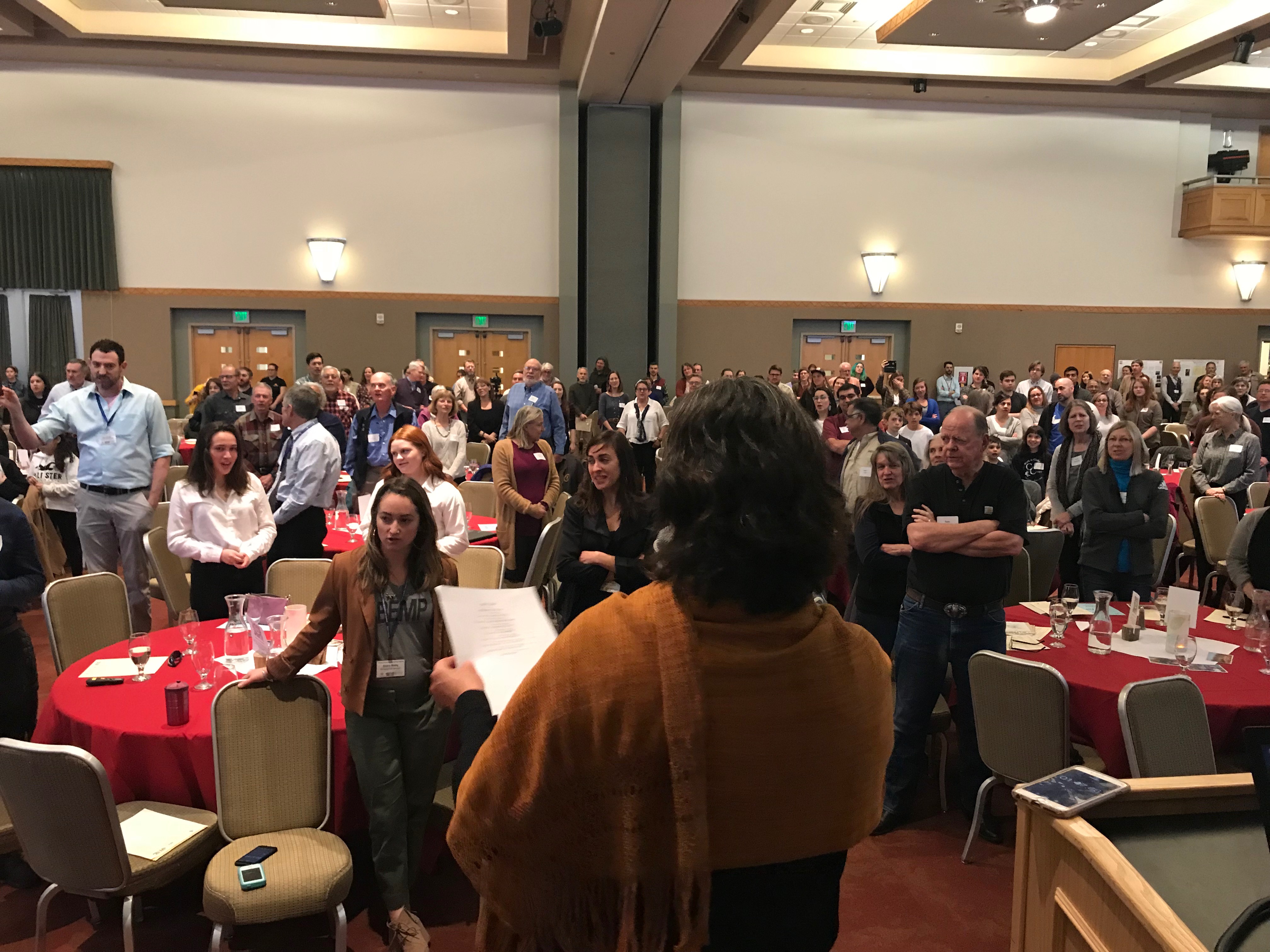 Crawford Symposium attendees participating in a poem with Albuquerque's Poet Laureate, Michelle Otero and Inez Elementary School BASS students. 